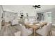 Open concept living and kitchen area with modern furniture at 1223 Jasmine Way, Clearwater, FL 33756
