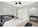 Comfortable main bedroom featuring soft lighting, closet, and modern decor at 1223 Jasmine Way, Clearwater, FL 33756