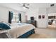 Bright bedroom features large window and dark furnishings at 12351 Nouveau Ave, Spring Hill, FL 34610
