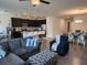 Open-concept living space showcasing living, kitchen, and dining areas at 12351 Nouveau Ave, Spring Hill, FL 34610