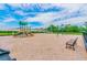 Community playground with slides, swings, and climbing structures, perfect for Gathering fun and outdoor activities at 12351 Nouveau Ave, Spring Hill, FL 34610