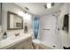Updated bathroom with shower and modern vanity at 1305 Willow Valley Dr, Brandon, FL 33510