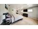 Comfortable bedroom with a large bed, dresser, and a mirrored closet providing ample storage at 1305 Willow Valley Dr, Brandon, FL 33510