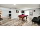 Finished game room with pool table, great for entertaining at 1305 Willow Valley Dr, Brandon, FL 33510