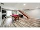 Finished game room with pool table and staircase at 1305 Willow Valley Dr, Brandon, FL 33510