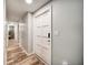 Hallway with hardwood floors leading to interior rooms at 1305 Willow Valley Dr, Brandon, FL 33510