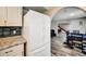 Open-concept kitchen with stainless steel refrigerator and an adjacent dining area at 1305 Willow Valley Dr, Brandon, FL 33510