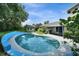 Enjoy a refreshing swim in this backyard pool, perfect for relaxation and outdoor fun at 1305 Willow Valley Dr, Brandon, FL 33510