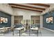 Bright and airy dining area with modern lighting, tables, and TV screens for relaxed socializing and entertainment at 13644 Canyon Ridge Rd, Spring Hill, FL 34610