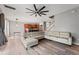 Open-concept living space with modern furniture and plenty of natural light at 13830 Trull Way, Hudson, FL 34669