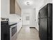 Modern kitchen with stainless steel appliances, sleek countertops, and ample storage space, great for culinary enthusiasts at 1512 Hillside Dr, Tampa, FL 33610
