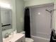 Practical bathroom featuring a shower-tub, classic fixtures, and functional design at 1605 Mission Hills Blvd # D5, Clearwater, FL 33759