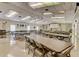 Spacious meeting room with tables and chairs perfect for large gatherings at 1605 Mission Hills Blvd # D5, Clearwater, FL 33759