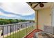 Balcony with seating overlooking a serene waterfront view and lush greenery at 163 Brent Cir, Oldsmar, FL 34677
