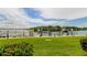 Picturesque view of a boat dock with boat slips, lush greenery, and waterfront scenery at 163 Brent Cir, Oldsmar, FL 34677