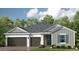 Charming single-story home with a two-car garage and welcoming front entrance and beautiful landscaping at 1633 Trailhead Ln, Zephyrhills, FL 33541