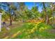 Large, private backyard with a well-maintained lawn, perfect for entertaining or enjoying quiet time outdoors at 1752 42Nd S St, St Petersburg, FL 33711