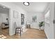 Bright living room with hardwood floors, neutral-toned walls, and minimalist decor at 1752 42Nd S St, St Petersburg, FL 33711