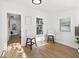 Bright living room with hardwood floors, neutral-toned walls, and minimalist decor at 1752 42Nd S St, St Petersburg, FL 33711