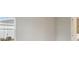 This is a spacious and bright bedroom, featuring a window and an ensuite bathroom at 17555 Glistening Ct, Venice, FL 34293