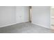 Bedroom featuring plush carpet and a closet with mirrored doors at 17555 Glistening Ct, Venice, FL 34293