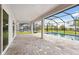 Spacious brick paver lanai overlooking a sparkling pool and well-manicured backyard at 17555 Glistening Ct, Venice, FL 34293