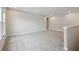 Upstairs loft area with neutral carpet and walls providing a versatile living space at 17555 Glistening Ct, Venice, FL 34293