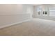 Spacious upstairs loft area offering ample room for relaxation or entertainment at 17555 Glistening Ct, Venice, FL 34293