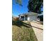 Charming single-story home with a well-maintained lawn and a convenient attached garage and front yard at 1782 Michigan Ne Ave, St Petersburg, FL 33703
