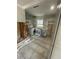 Kitchen featuring new stainless steel appliances and tile flooring awaiting remodel at 1782 Michigan Ne Ave, St Petersburg, FL 33703