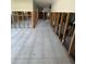 Spacious living room featuring tile flooring and exposed framing, ready for customization at 1782 Michigan Ne Ave, St Petersburg, FL 33703