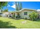 This home has a cozy backyard with a covered patio perfect for outdoor gatherings at 1857 N Belleair N Rd, Clearwater, FL 33764