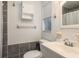 Cozy bathroom with modern fixtures, mirror, and cabinet at 1949 Kings Hwy, Clearwater, FL 33755