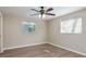 Comfortable bedroom featuring ceiling fan and natural light at 1949 Kings Hwy, Clearwater, FL 33755