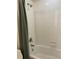Bathroom featuring a tub and shower combo with white tiles at 20101 Oakflower Ave, Tampa, FL 33647