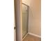 Bathroom featuring a glass enclosed shower with white tiling at 20101 Oakflower Ave, Tampa, FL 33647