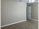 Spacious carpeted bedroom with a ceiling fan and base trim at 20101 Oakflower Ave, Tampa, FL 33647