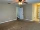 Bedroom with wall-to-wall carpet and neutral walls, ready for personal touches at 20101 Oakflower Ave, Tampa, FL 33647