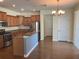 Open kitchen featuring stainless steel appliances, granite countertops, and wood cabinets at 20101 Oakflower Ave, Tampa, FL 33647