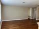 Hardwood floor in a spacious living room offering ample space for entertaining at 20101 Oakflower Ave, Tampa, FL 33647