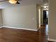 Open floor plan offering hardwood floors and easy access to other areas of the home at 20101 Oakflower Ave, Tampa, FL 33647