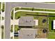 Drone's eye view of two properties showcasing their rooflines, backyards, and proximity to each other at 22359 Storybook Cabin Way, Land O Lakes, FL 34637