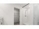 Bathroom featuring tiled shower with a walk-in closet at 22359 Storybook Cabin Way, Land O Lakes, FL 34637