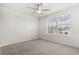 Bedroom with a window with natural light at 22359 Storybook Cabin Way, Land O Lakes, FL 34637