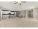 Bright and airy open-concept kitchen and dining area with stainless steel appliances and modern finishes at 22359 Storybook Cabin Way, Land O Lakes, FL 34637