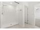 Bathroom featuring tiled shower with a shower head at 22359 Storybook Cabin Way, Land O Lakes, FL 34637