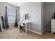 Bedroom featuring neutral walls, carpet flooring, a desk and window at 2699 Suncoast Blend Dr, Odessa, FL 33556