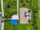 Aerial view of playground with covered picnic area, benches, and play equipment at 2699 Suncoast Blend Dr, Odessa, FL 33556
