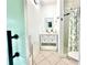 Clean bathroom featuring a white vanity with storage and a shower at 2707 56Th S St, Gulfport, FL 33707