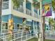Artistically decorated storefront exterior featuring colorful murals and a welcoming entrance, creating a vibrant and inviting atmosphere at 2707 56Th S St, Gulfport, FL 33707